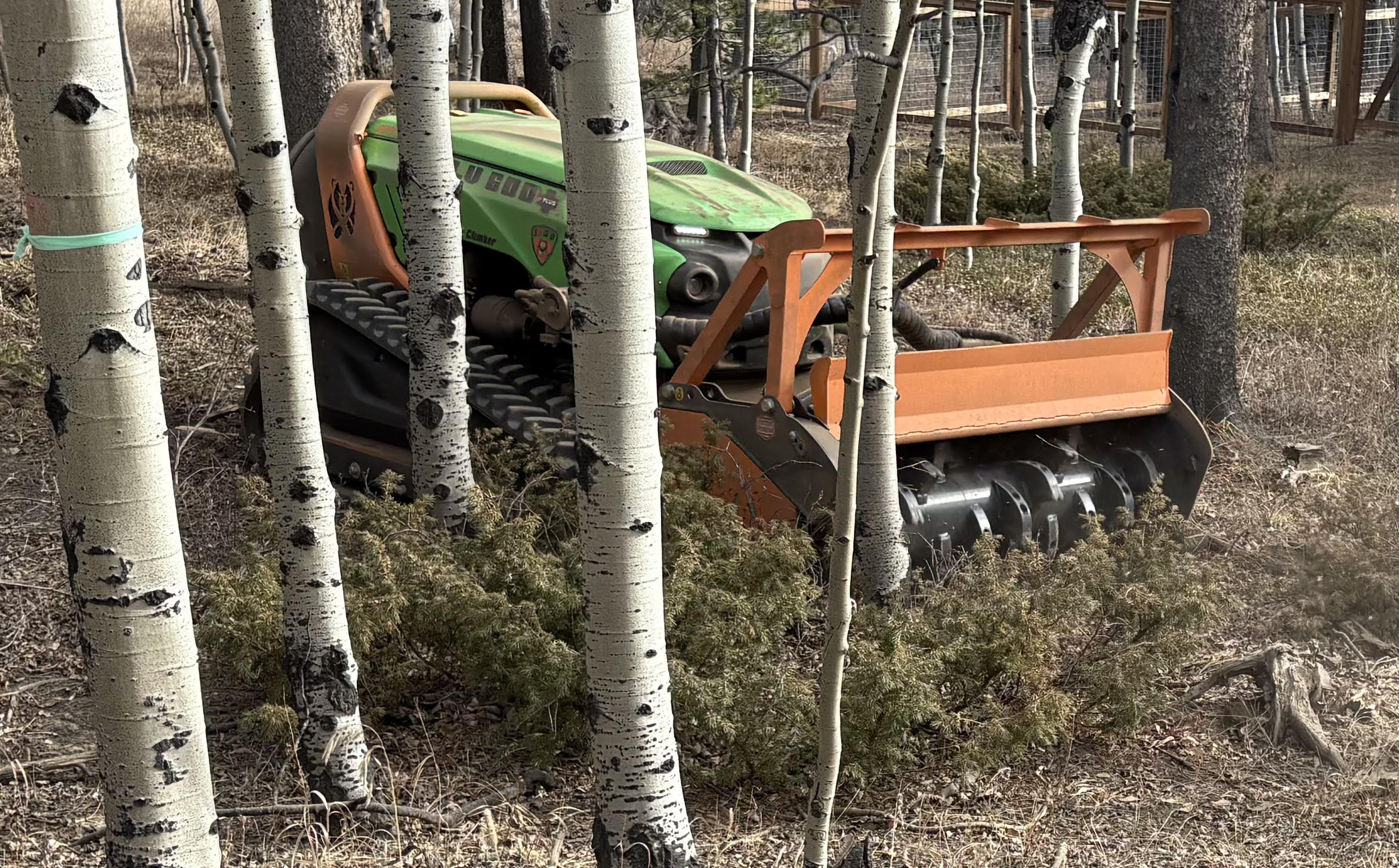 Forestry mulching equipment clearing steep terrain in Boulder County
